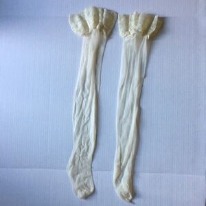 New without tags. Thigh high creme pantyhose/nylons. Sz Medium.